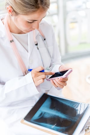 Nurse using mobile cloud-based CMMS